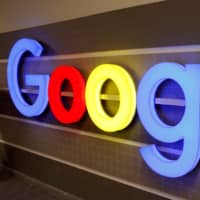 An illuminated Google logo is seen inside an office building in Zurich last December.