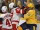 Detroit Red Wings left wing Tyler Bertuzzi (59) hitsNashville