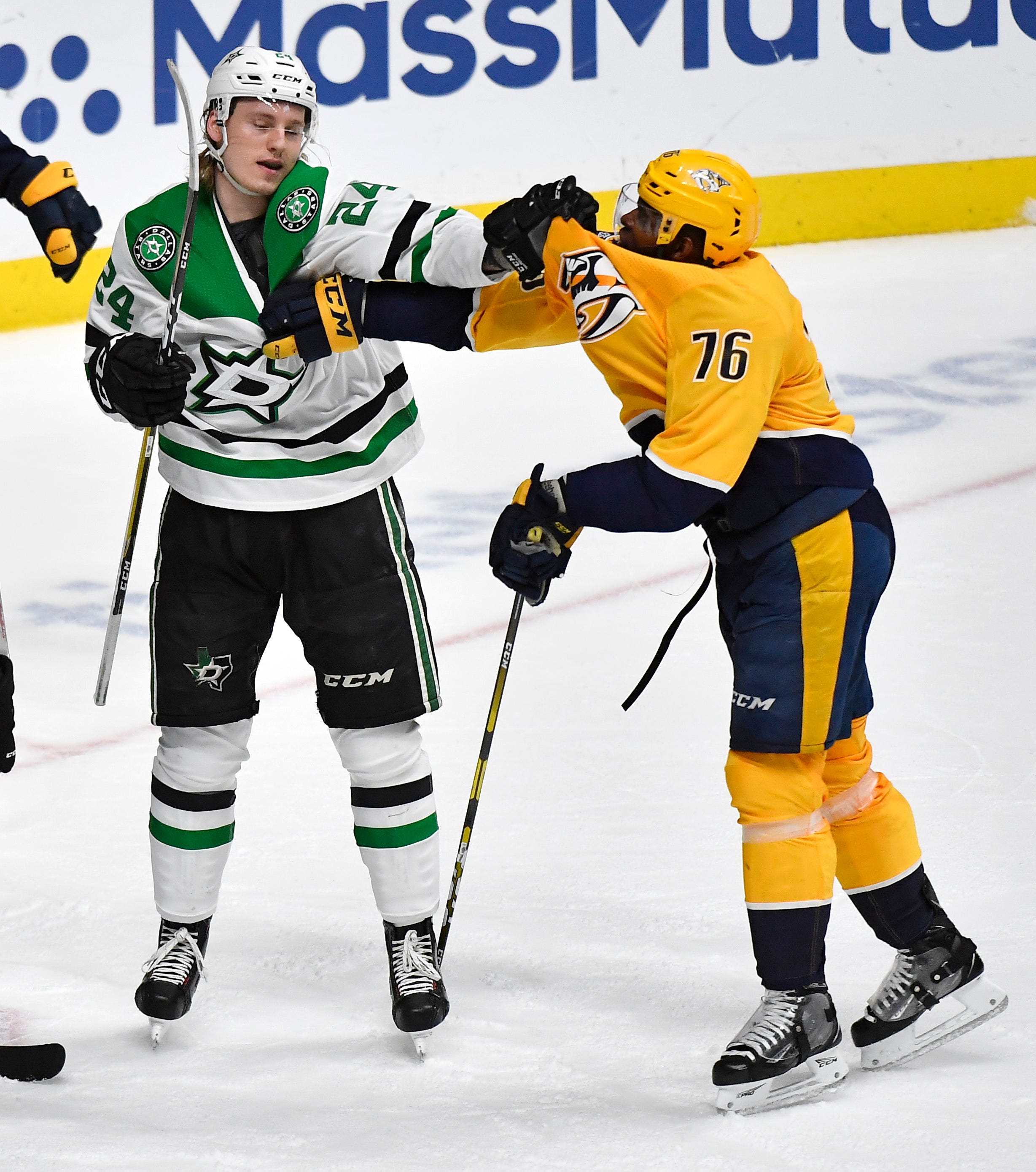 Dallas Stars left wing Roope Hintz (24) and Nashville Predators defenseman P.K. Subban (76) mix it up during the first period of the divisional semifinal game at Bridgestone Arena in Nashville, Tenn., Saturday, April 13, 2019.