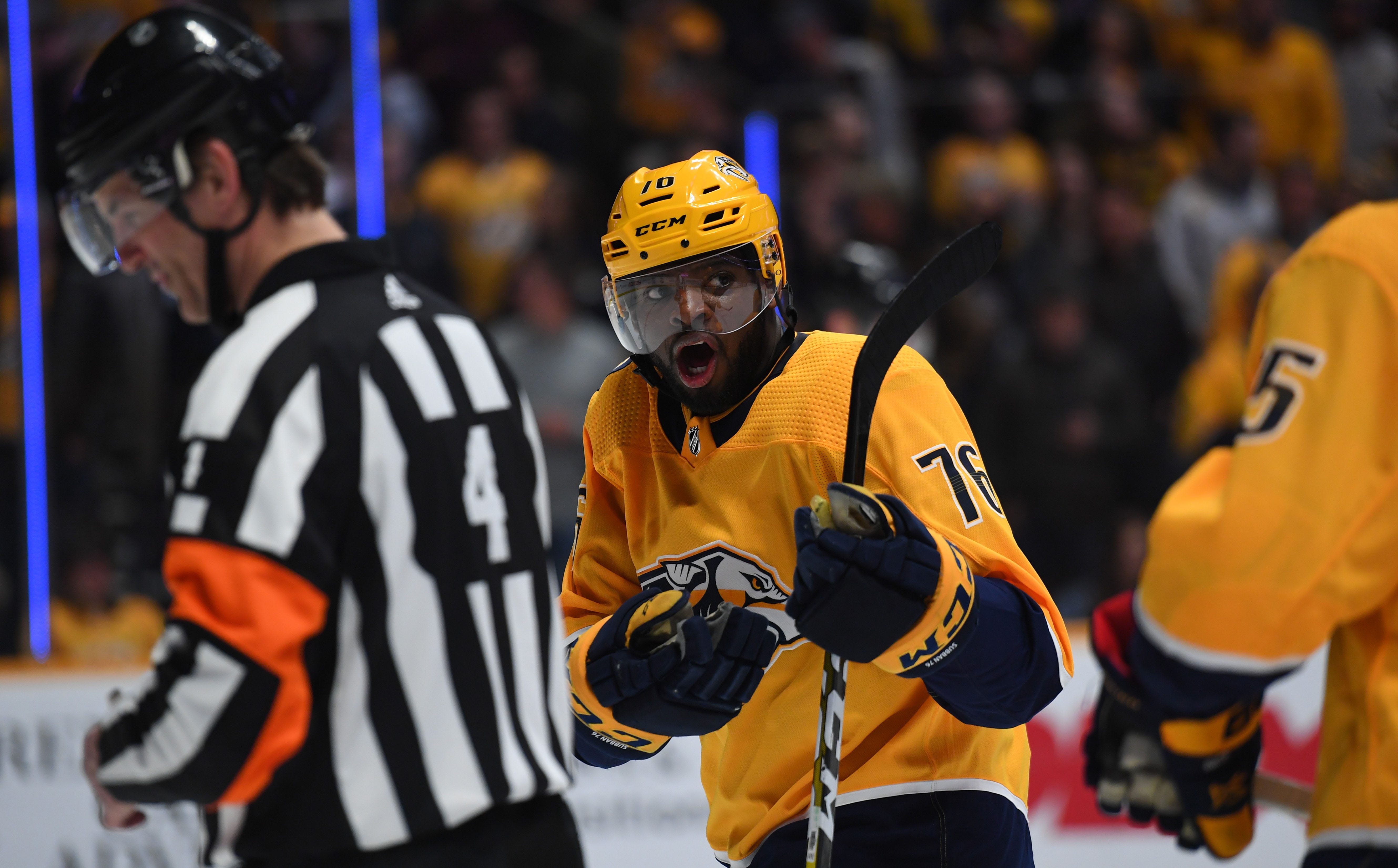 Mar 5, 2019; Nashville, TN, USA; Nashville Predators defenseman P.K. Subban (76) talks with referee Wes McCauley (4) after he was tripped by McCauley on a play during the second period against the Minnesota Wild at Bridgestone Arena. Mandatory Credit: Christopher Hanewinckel-USA TODAY Sports