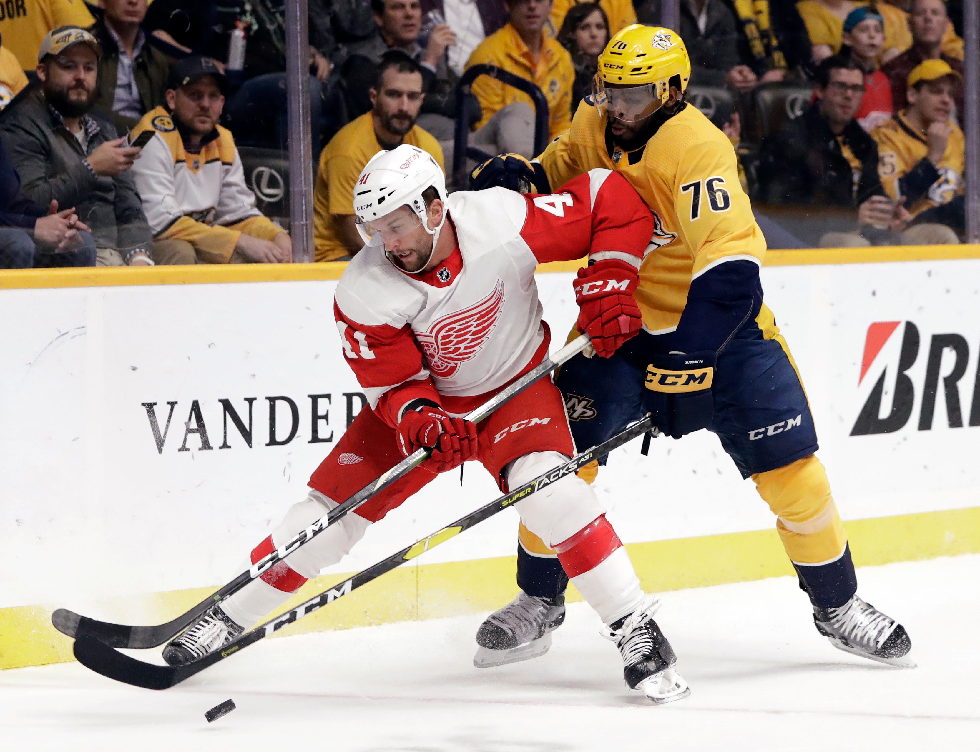 Detroit Red Wings center Luke Glendening (41) is defended by Nashville Predators' P.K. Subban (76) during the first period of an NHL hockey game Tuesday, Feb. 12, 2019, in Nashville, Tenn.