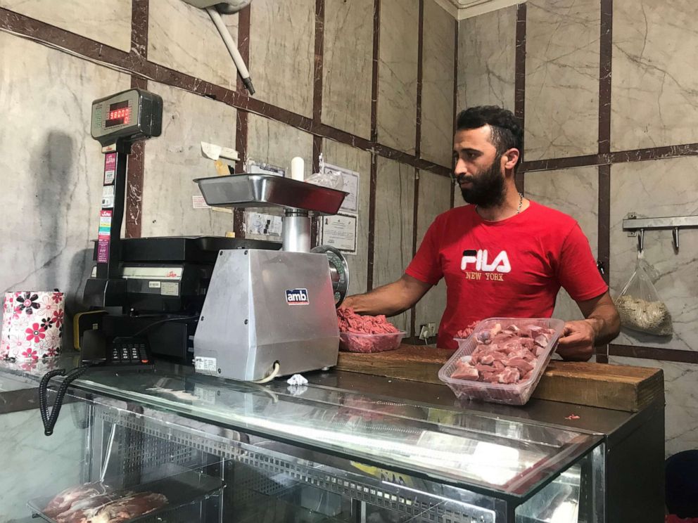 PHOTO: A butcher in Irans capital, Tehran, handles meat on June 2, 2019. The price of meat has doubled as the rials value has fallen in the wake of the United States reimposing sanctions on the Iran and pulling out of the Iranian nuclear deal.