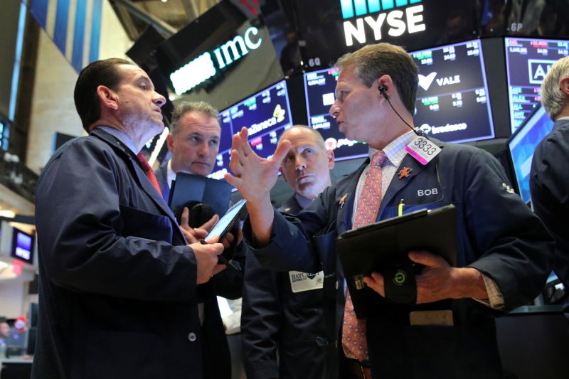 Traders work on the main trading floor after the opening bell at New York Stock Exchange (NYSE) in New York, U.S. June 20, 2019. REUTERS/Brendan McDermid