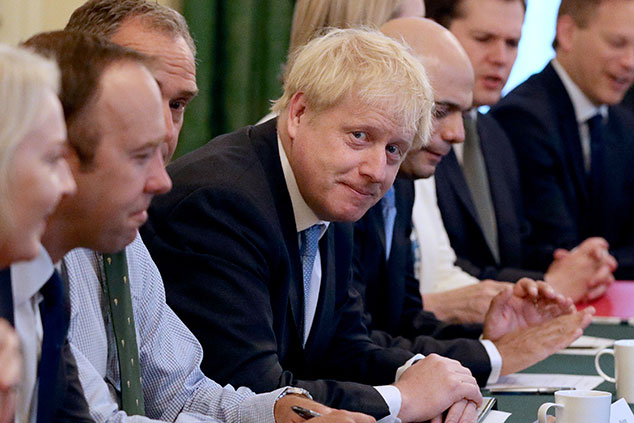 Boris Johnson with his Cabinet © Getty images