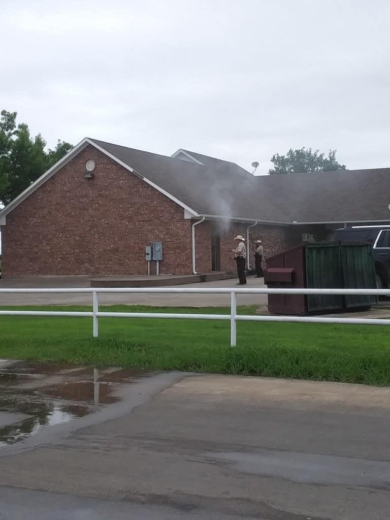 Smoke errupts from the doors of the Enloe State Bank On May 11, 2019. (Courtesy of Teresa Thompson)