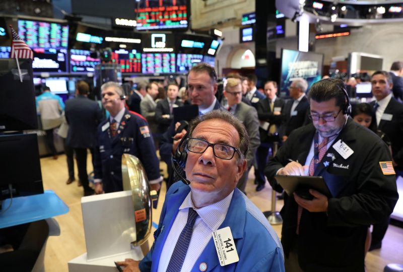 Traders work on the main trading floor of New York Stock Exchange (NYSE) after the opening bell of the trading session in New York City, New York, U.S., July 25, 2019. REUTERS/Brendan McDermid