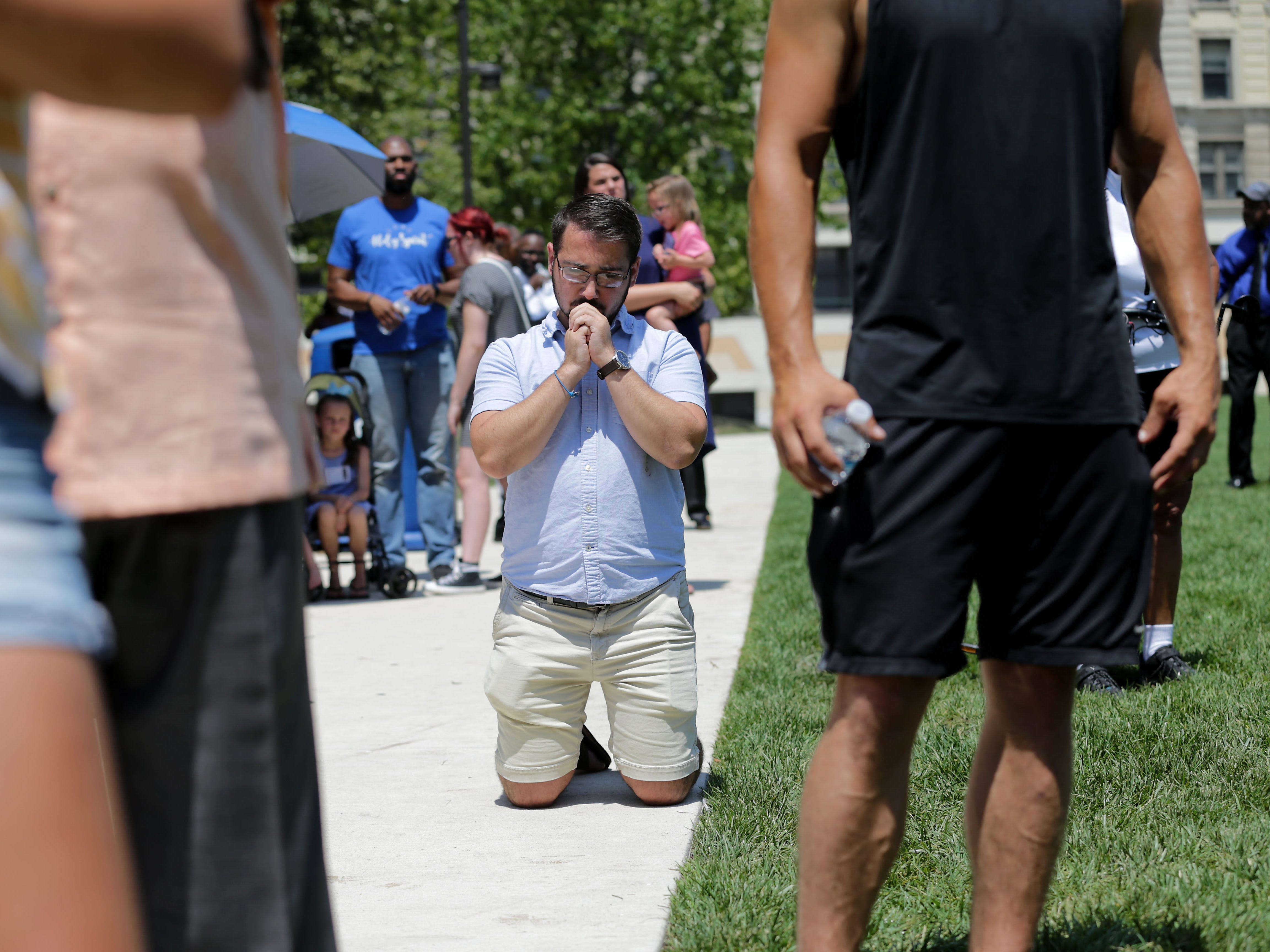 Mourners gather at Levitt Pavilion following the mass shooting that left at least nine dead and 26 injured in Dayton, Ohio.