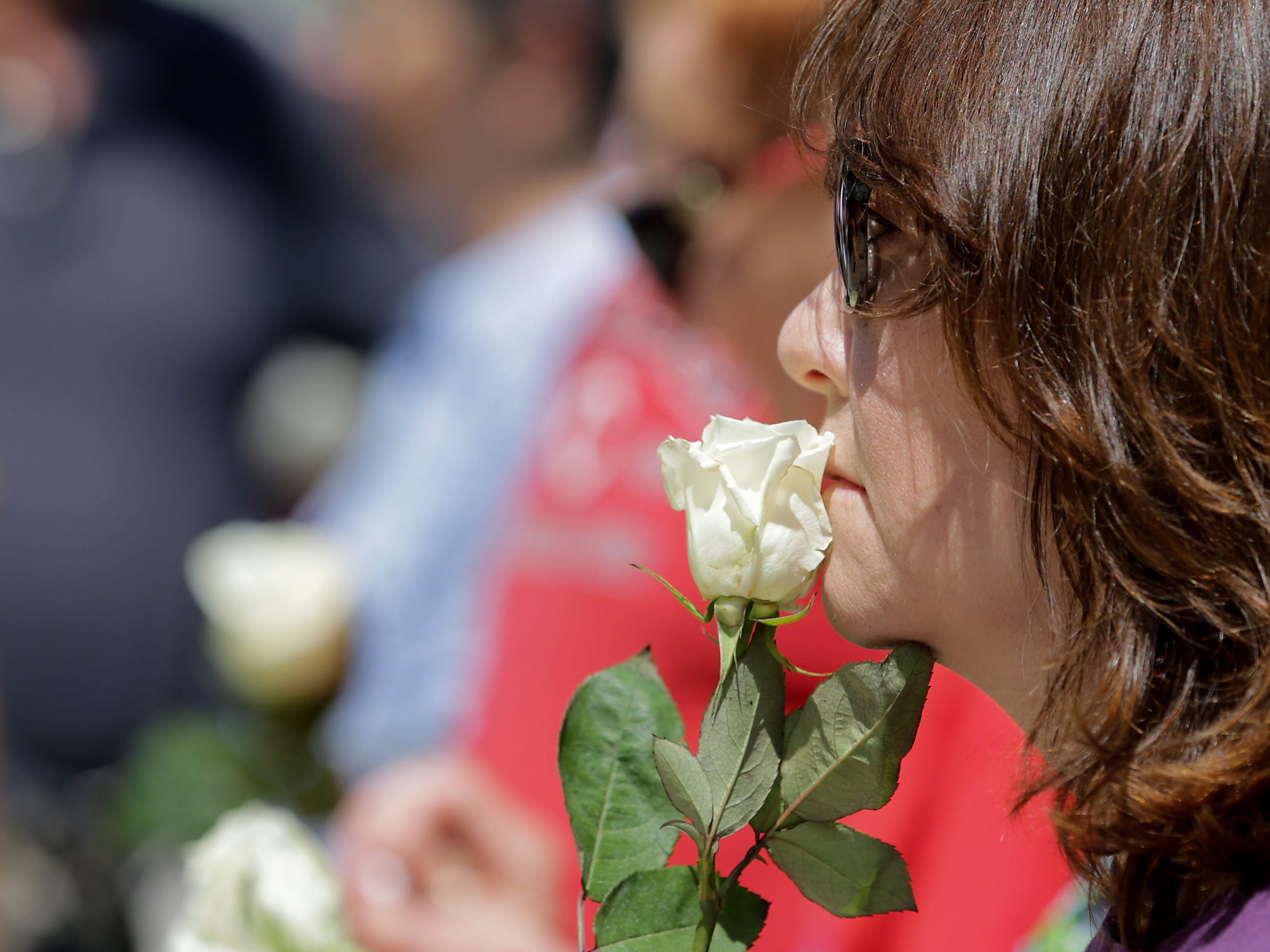 Mourners gather at Levitt Pavilion following the mass shooting that left at least nine dead and 26 injured in Dayton, Ohio.