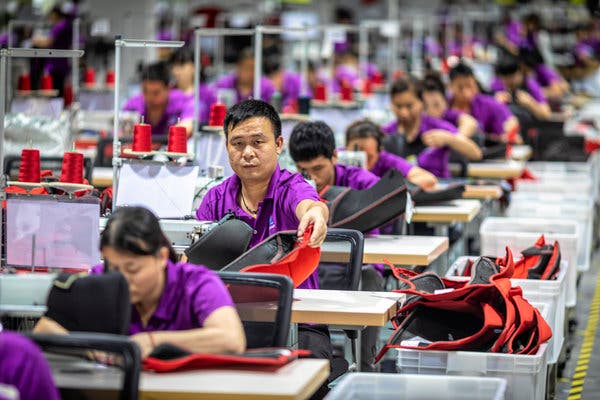 A factory producing baby products in Guangdong Province, China. The country’s industrial output grew last month at its slowest pace in 17 years.