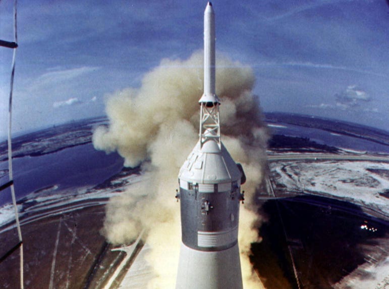 The Saturn V rocket lifts off from launch pad 39A at the Kennedy Space Center on July 16, 1969, at the start of the Apollo 11 lunar landing mission. Astronauts Neil Armstrong, Edwin E. "Buzz" Aldrin, Jr., and Michael Collins blasted off for the first man on the Moon mission.