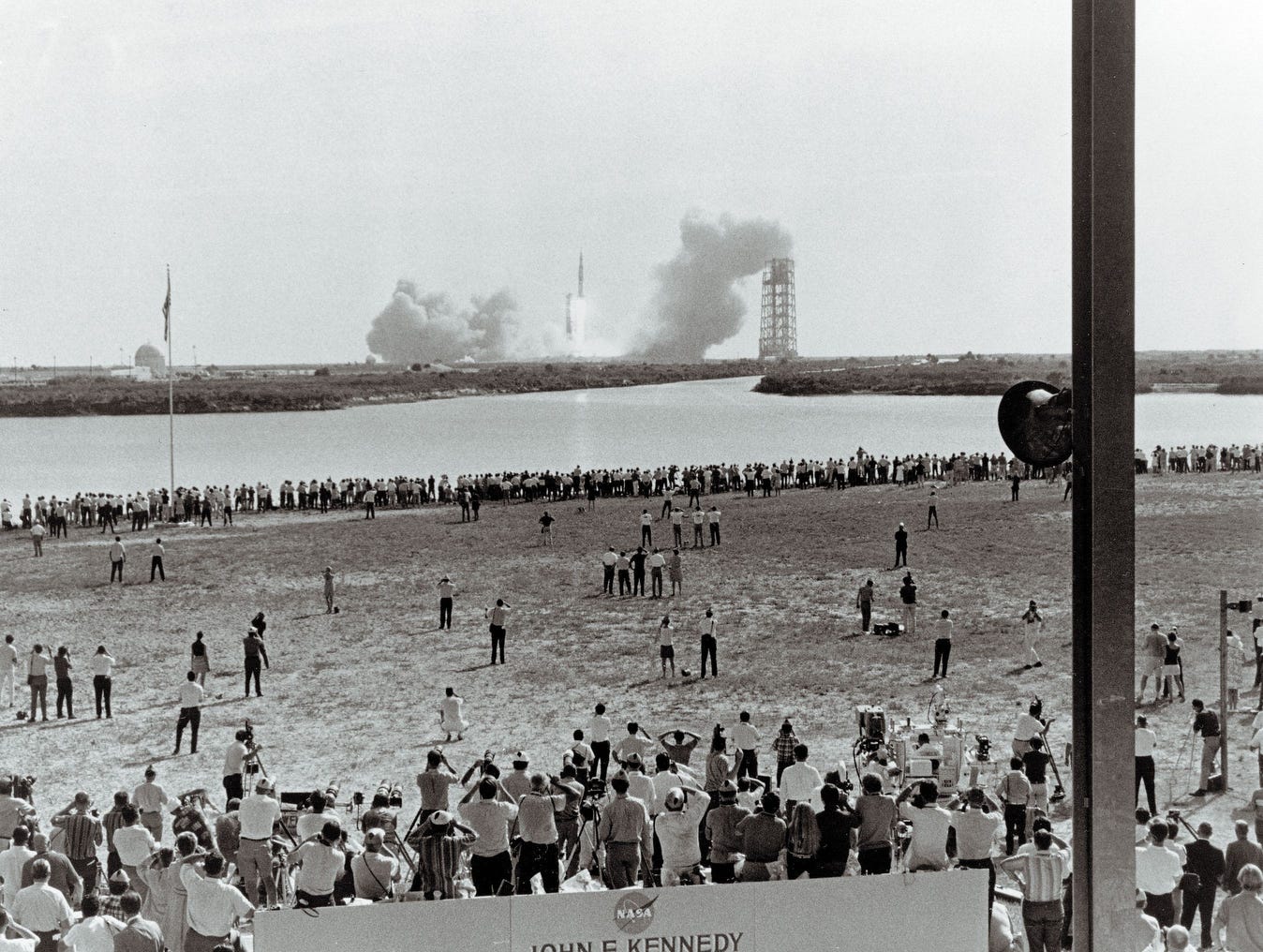 Thousands of people camped out on beaches and roads adjacent to the Kennedy Space Center to watch the Apollo 11 mission liftoff aboard the Saturn V rocket July 16, 1969.