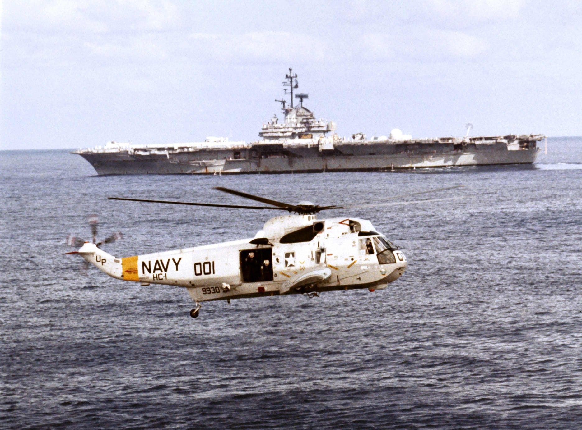 The Apollo 17 recovery Operations shortly after splashdown shows the Apollo 17 spacecraft bottom, the recovery helicopter and the recovery vessel, USS Ticonderoga. Apollo XVII was the final Lunar landing mission of the Apollo Program, on Dec.r 19, 1972.