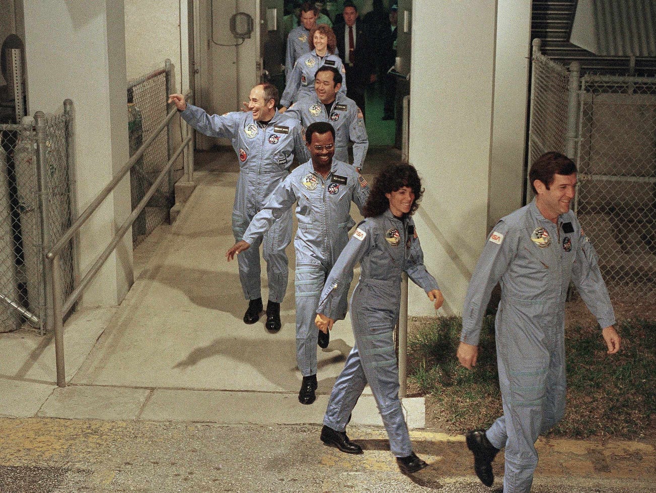 In this Jan. 27, 1986 file picture, the crew for the space shuttle Challenger leaves their quarters for the launch pad at Kennedy Space Center in Cape Canaveral, Fla. From foreground are: commander Francis Scobee, Mission Spl. Judith Resnik, Mission Spl. Ronald McNair, Payload Spl. Gregory Jarvis, Mission Spl. Ellison Onizuka, teacher Christa McAuliffe and pilot Michael Smith.