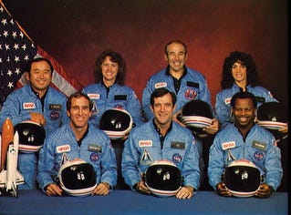 Crew members of space shuttle Challenger and mission STS-51 were: back row; Mission specialist Ellison S. Onizuka, from left, Teacher in Space Participant Sharon Christa McAuliffe, Payload Specialist Greg Jarvis and Mission specialist Judy Resnik. In the front row are Pilot Mike Smith, from left, Commander Dick Scobee, and Mission specialist Ron McNair. Challenger exploded shortly after liftoff on Jan. 28, 1986, killing all aboard.