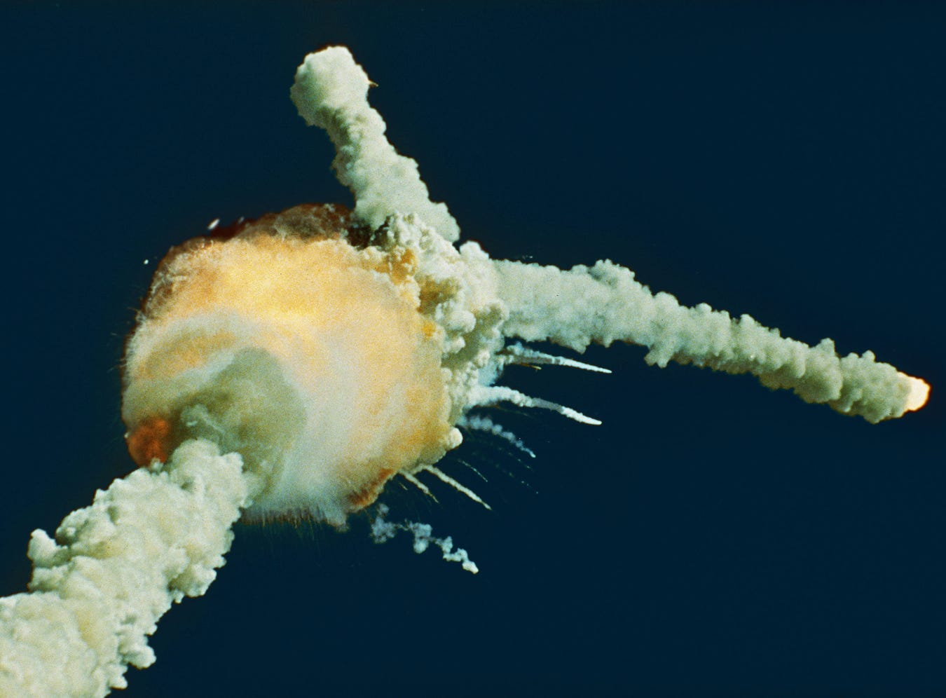 The space shuttle Challenger explodes shortly after lifting off from Kennedy Space Center in this Jan. 28, 1986 file photo. All seven crew members died in the explosion, which was blamed on faulty O-rings in the shuttle's booster rockets. The disaster shattered NASA's image and the belief that flying on a spacecraft could become as routine as flying on an airplane.