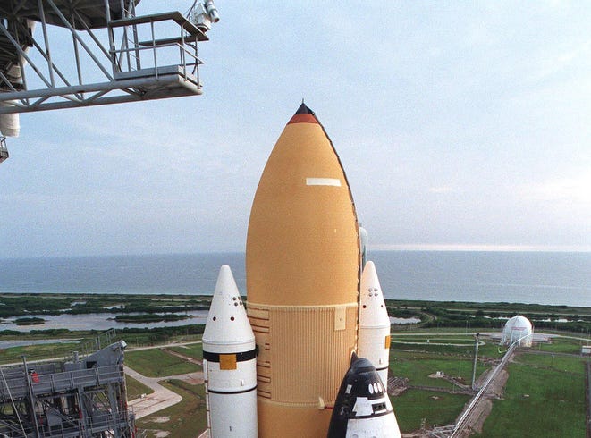 In this file photo taken on Sept. 20, 1998, the US Space Shuttle Discovery is sits on launch pad 39-B at Kennedy Space Center, Florida, in preparation for its scheduled Oct. 29 mission.