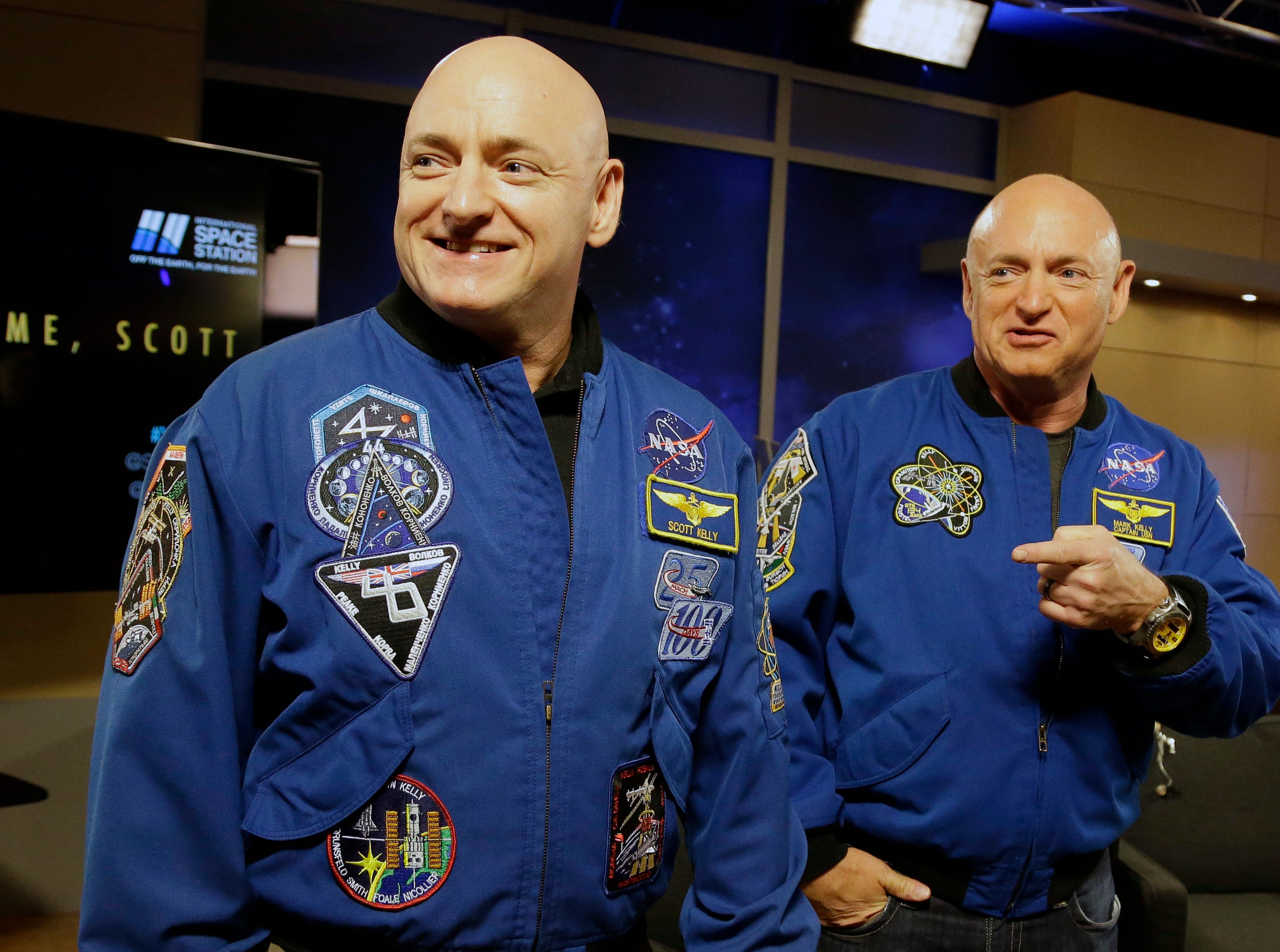 Two astronauts in one family! NASA astronaut Scott Kelly, left, and his twin Mark get together before a press conference, March 4, 2016, in Houston. Scott Kelly set a U.S. record with his a 340-day mission to the International Space Station. Mark is the husband of former Congresswoman Gabrielle Giffords, and is an author, political activist, and aerospace consultant.