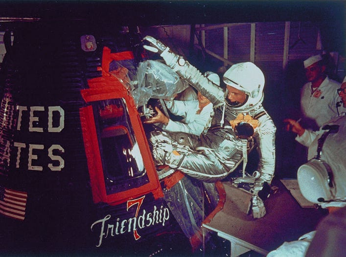 US astronaut John Glenn enters the Mercury "Frienship-7" capsule in Cape Canaveral, Fla., prior to the launch of the spacecraft for the first US manned orbital flight ever.