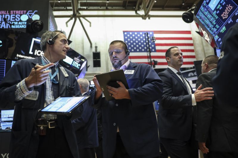 NEW YORK, NY - AUGUST 19: Traders and financial professionals work on the floor of the New York Stock Exchange (NYSE) at the opening bell on August 19, 2019 in New York City. The Dow Jones Industrial Average traded over 300 points higher at the open on Monday morning. (Photo by Drew Angerer/Getty Images)