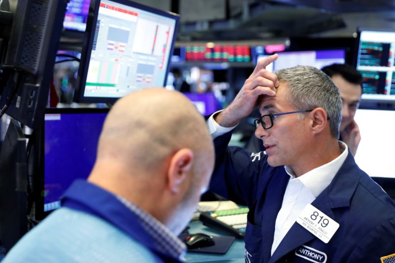 Traders work on the floor of the New York Stock Exchange shortly after the closing bell in New York, U.S., August 23, 2019. REUTERS/Lucas Jackson