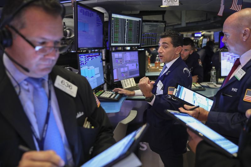 NEW YORK, NY - AUGUST 19: Traders and financial professionals work on the floor of the New York Stock Exchange (NYSE) at the opening bell on August 19, 2019 in New York City. The Dow Jones Industrial Average traded over 300 points higher at the open on Monday morning. (Photo by Drew Angerer/Getty Images)