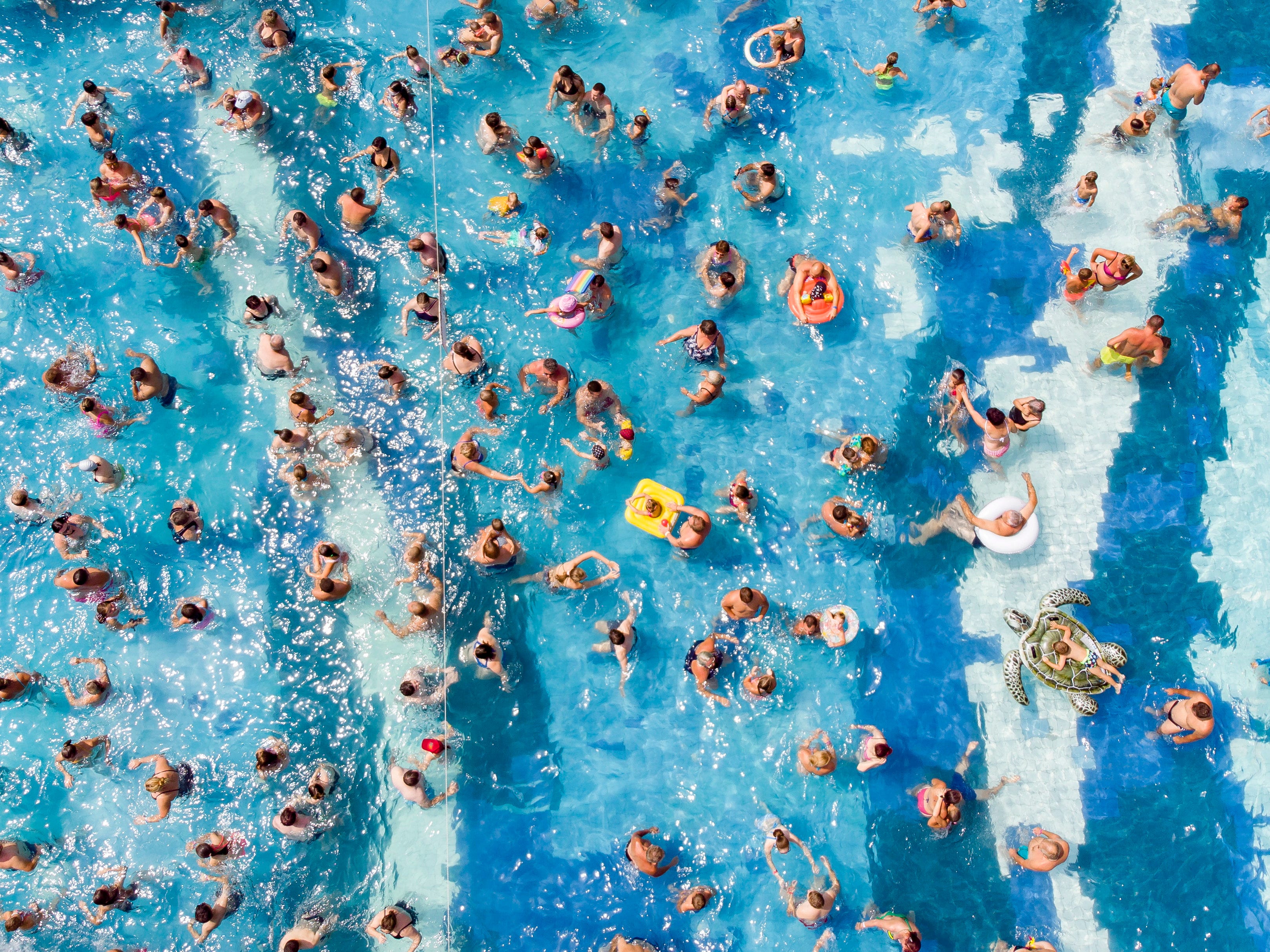 People swim in a pool in Zalakaros, Hungary.