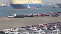 In this March 5, 2019, photo, cars for export park at a port in Yokohama, near Tokyo. Government data show Japan's exports fell for the eighth straight month in July as worries continued about President Donald Trump's trade policies denting Asian eco