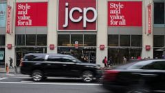 FILE - In this May 16, 2018, file photo, traffic makes its way past a logo J.C. Penney store outside the Manhattan mall in New York. J.C. Penney Co. reports financial results Thursday, Aug. 15..(AP Photo/Mary Altaffer, File)