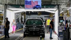 FILE - In this June 24, 2019, file photo Ford's employees work on a Lincoln Aviator line at Ford's Chicago Assembly Plant in Chicago's Hegewisch neighborhood. On Thursday, Aug. 15, the Federal Reserve reports on U.S. industrial production for July. (