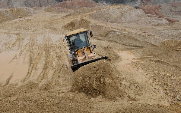 A rare earth mine in China’s Jiangxi Province. China has a virtual lock on global supplies of rare earths and the components they go into, making the industrial minerals a possible weapon in the trade war with the United States.