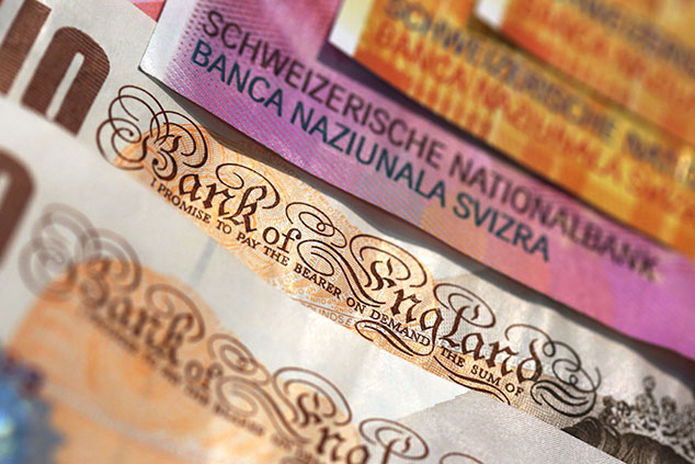 Swiss franc notes and UK pound notes © Chris Ratcliffe/Bloomberg via Getty Images