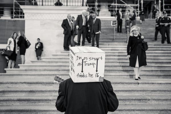 A protester serenaded lawmakers on Capitol Hill on Wednesday.