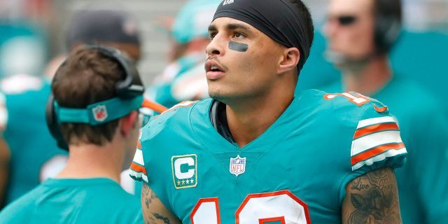 FILE - In this Dec. 9, 2018, file photo, Miami Dolphins wide receiver Kenny Stills (10) stands along the sideline during the first half of the team's NFL football game against the New England Patriots in Miami Gardens, Fla. (Associated Press)