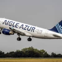 An Airbus A319 of Weaving group's French airline Aigle Azur takes off from Lille Airport in Lesquin, northern France, in 2017. Aigle Azur airline, in cessation of payments, asked to be placed into receivership, AFP reported Monday.