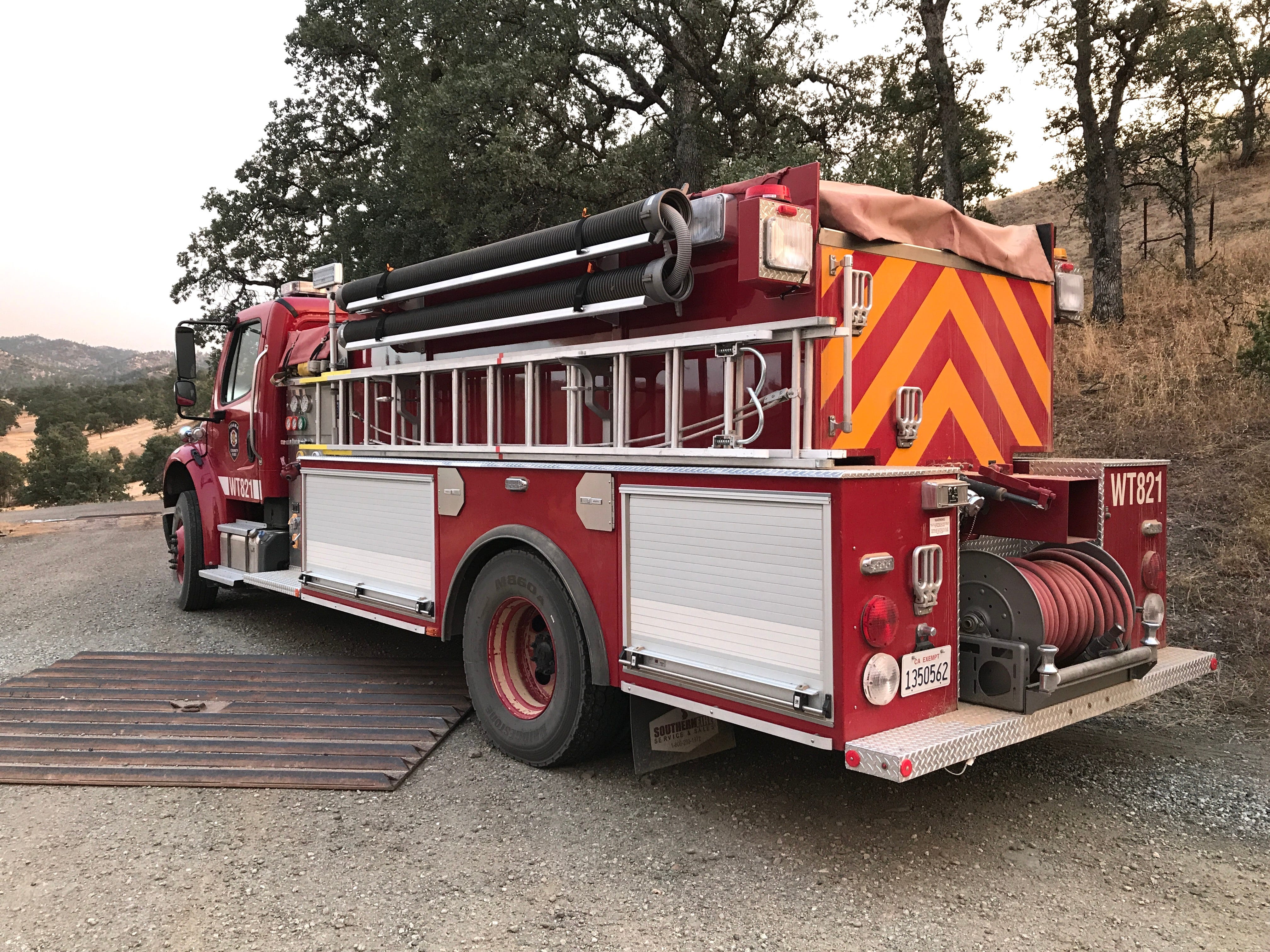 A Cal Fire engine sits on Vestal Road off Highway 36 waiting to be sent to the Red Bank Fire on Thursday evening, Sept. 5, 2019.