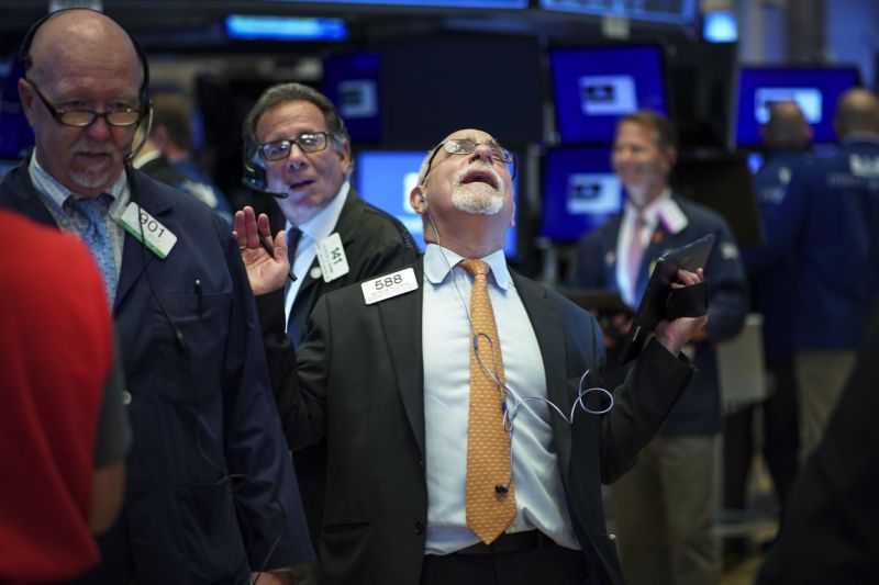 NEW YORK, NY - AUGUST 19: Traders and financial professionals work on the floor of the New York Stock Exchange (NYSE) at the opening bell on August 19, 2019 in New York City. The Dow Jones Industrial Average traded over 300 points higher at the open on Monday morning. (Photo by Drew Angerer/Getty Images)