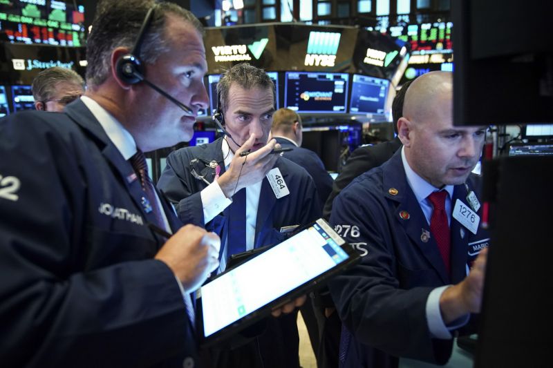 NEW YORK, NY - AUGUST 6: Traders and financial professionals work at the opening bell on the floor of the New York Stock Exchange (NYSE) on August 6, 2019 in the Brooklyn borough of New York City. The Dow Jones Industrial Average traded 220 points higher at the open on Tuesday, after U.S. markets had their worst trading day of 2019 on Monday amid escalations in the U.S.-China trade war. (Photo by Drew Angerer/Getty Images)