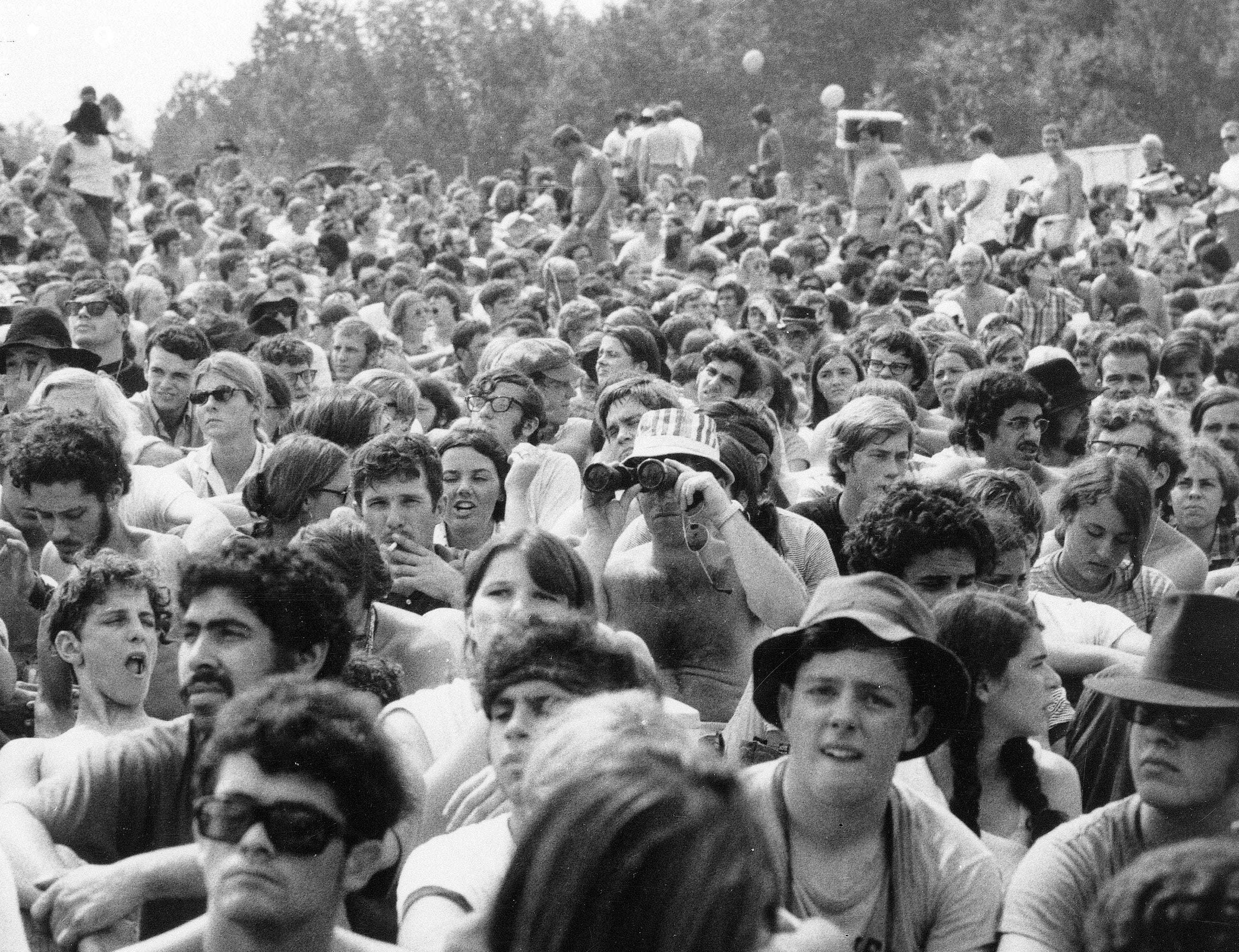 This 1969 file photo shows the crowd at the Woodstock Music and Arts Festival, held on a 600-acre pasture in the Catskill Mountains near White Lake in Bethel.