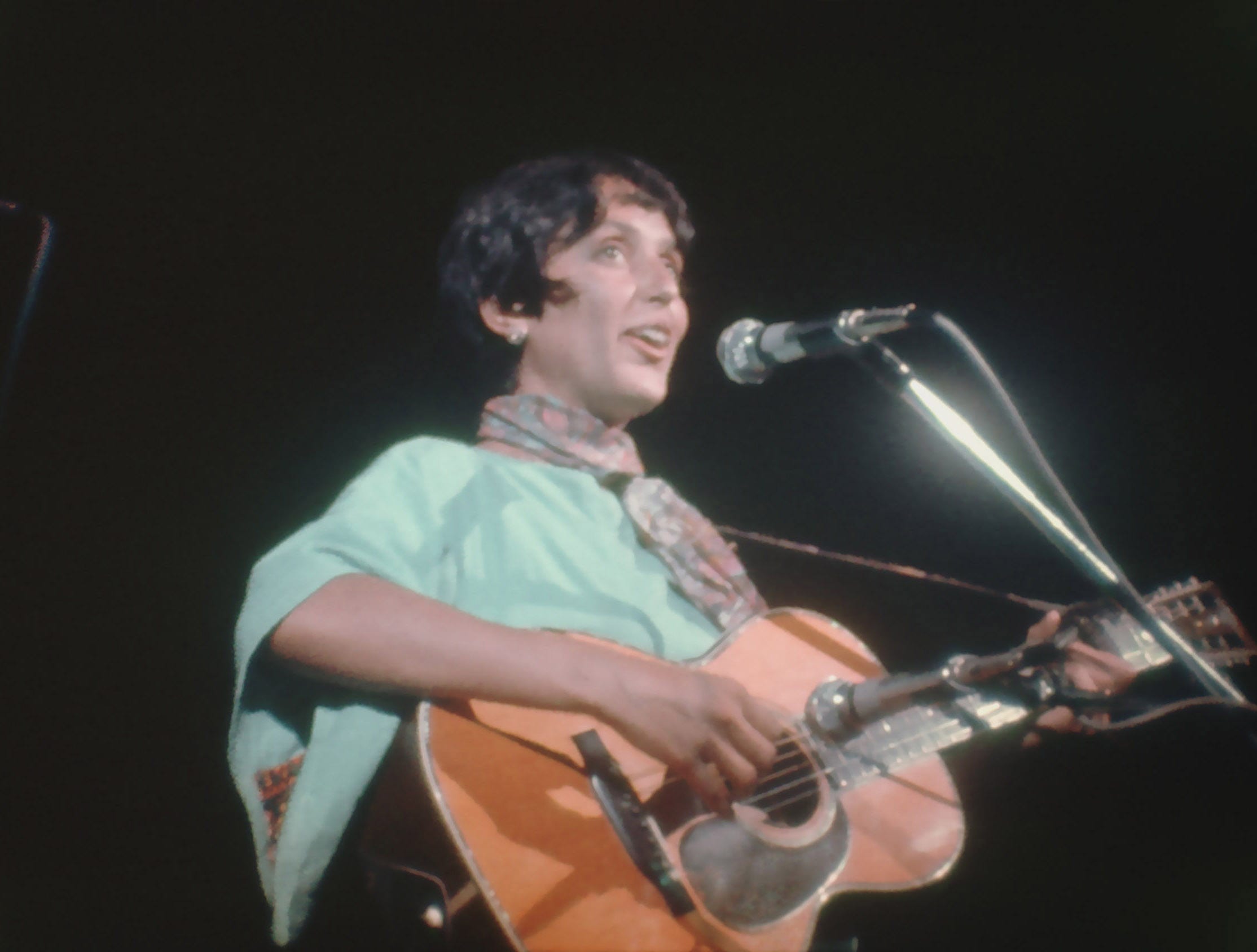 Joan Baez on stage at the Woodstock festival in 1969.