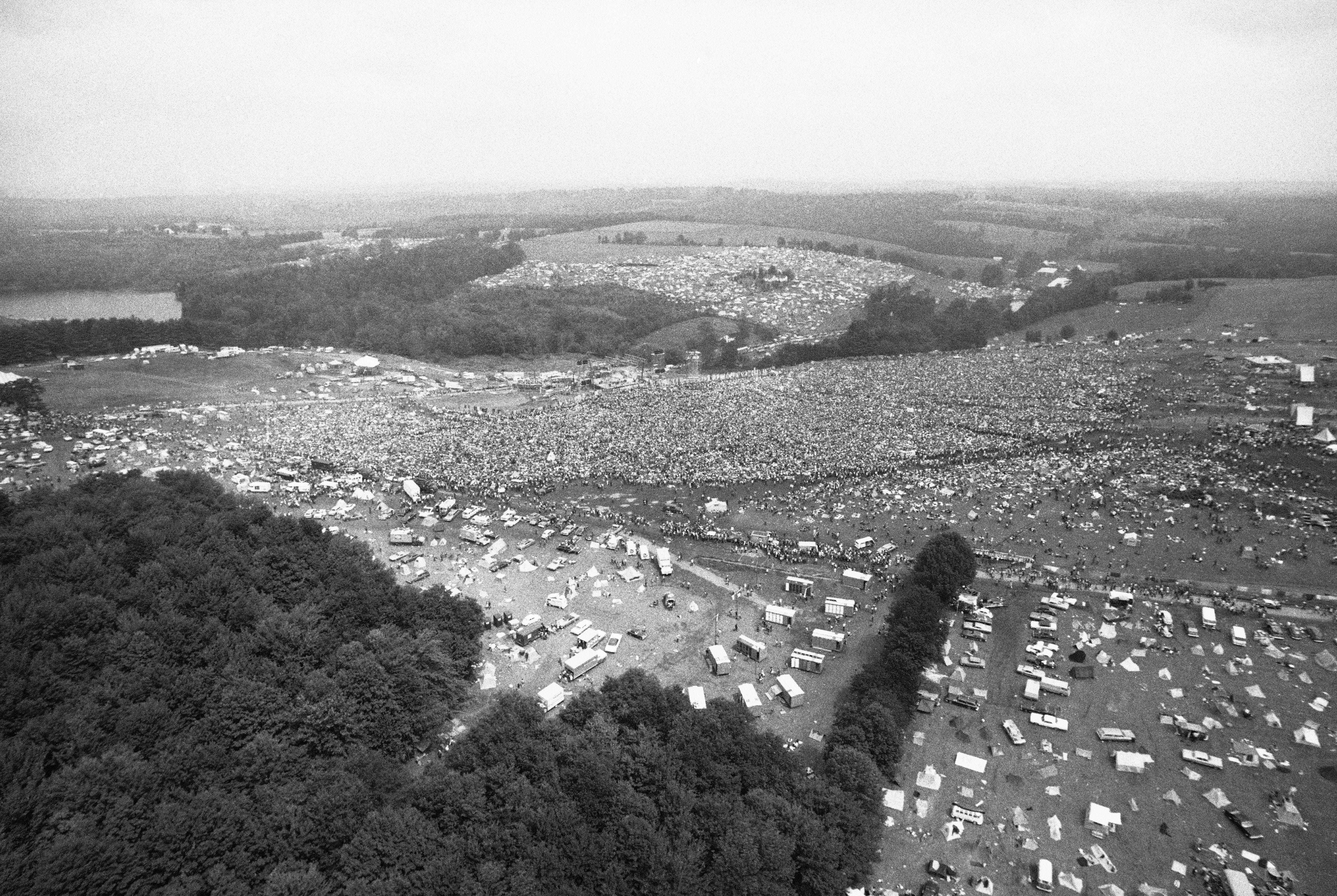 This is an aerial photo of the Woodstock Music and Arts Festival held on 600 acres of cow pasture leased from a farmer at White Lake in Bethel, Sullivan County, N.Y., in Aug. 1969. The festival, billed as "Thee Days of Peace and Music," started on Friday, Aug. 15 and ended Monday morning, Aug. 18. More than 450,000 persons attended.