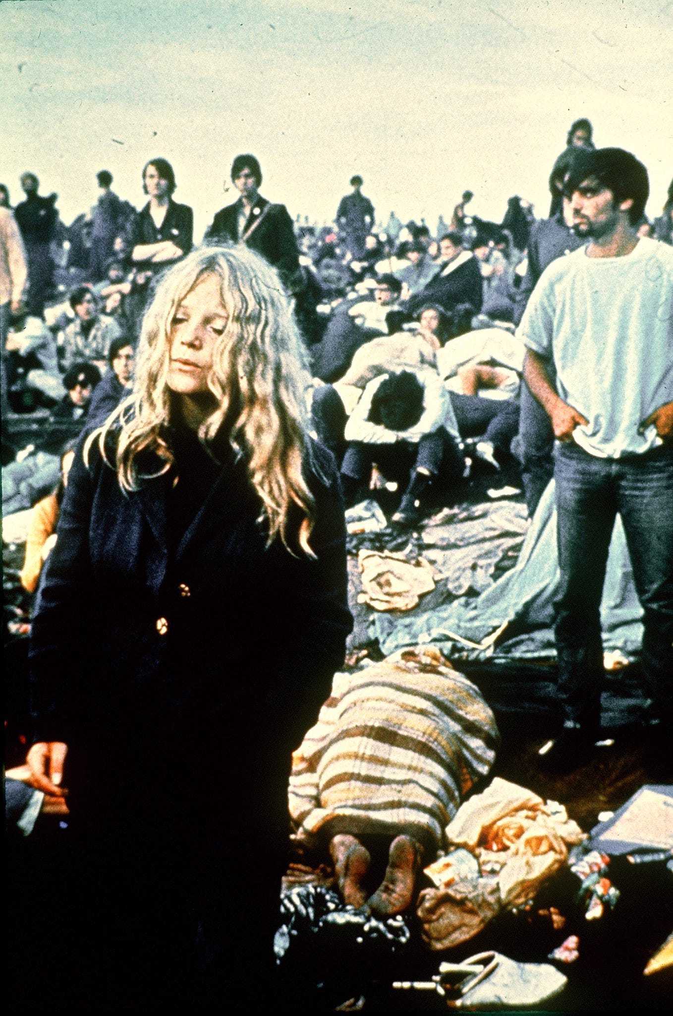 People attend the Woodstock Festival of Arts and Music at Bethel, New York, August 1969.