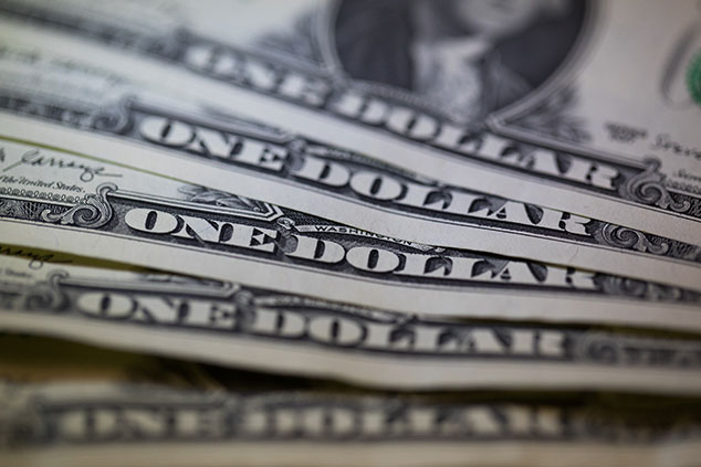 US dollar bills © Chris Ratcliffe/Bloomberg via Getty Images