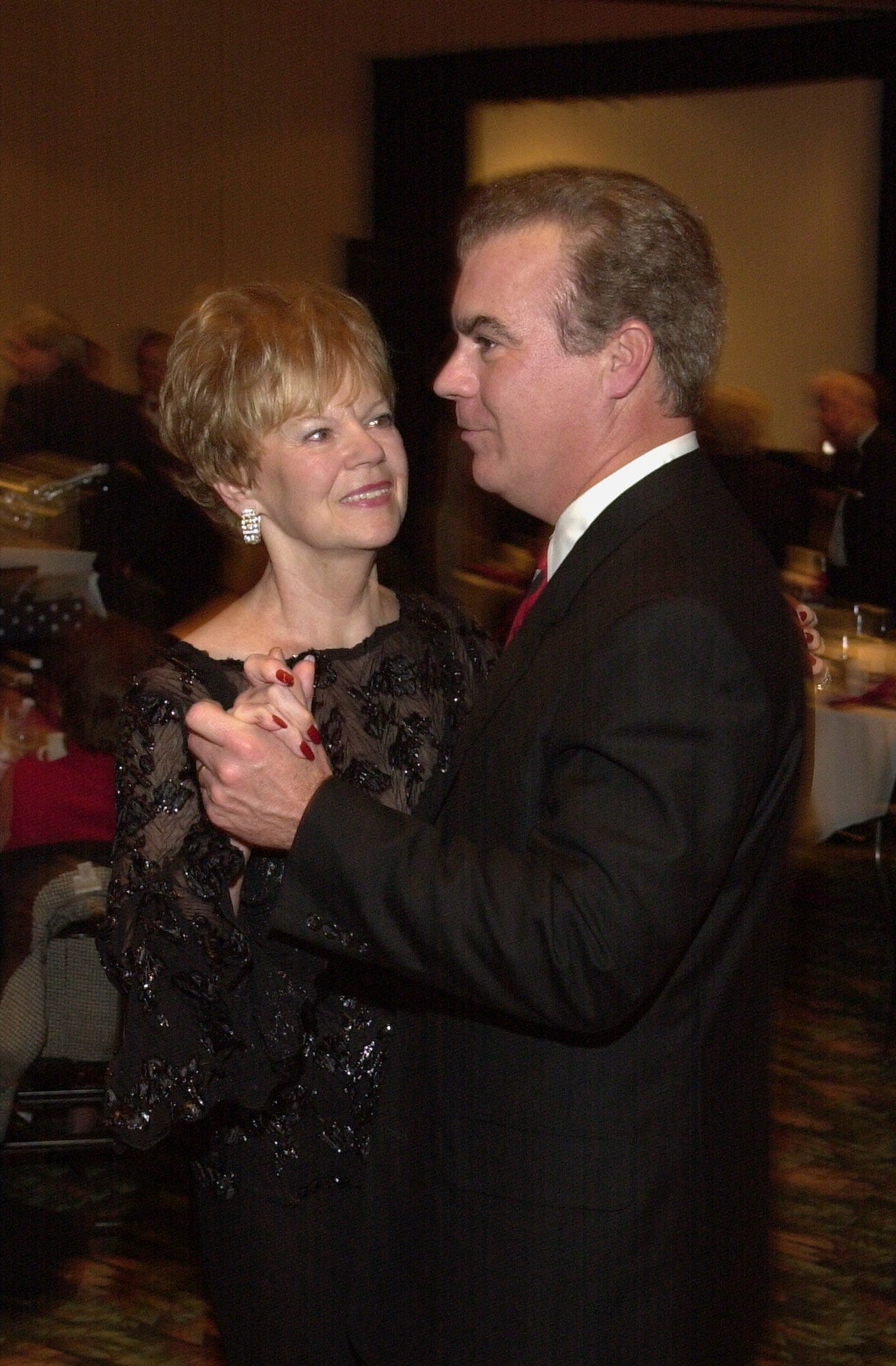 2002.11.16.social-bob braun gala.Rob Braun takes Wray Jean Braun, his mother, for a spin around the dance floor.