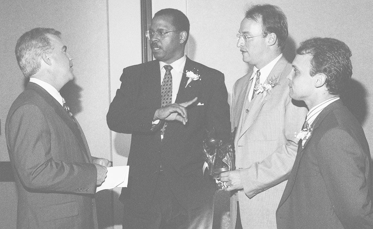 Text: At the Common Ground Ministries banquet, May 23, 1996 - from left, Rob Braun, J. Kenneth Blackwell, Monty Lobb and Dennis Dalton.