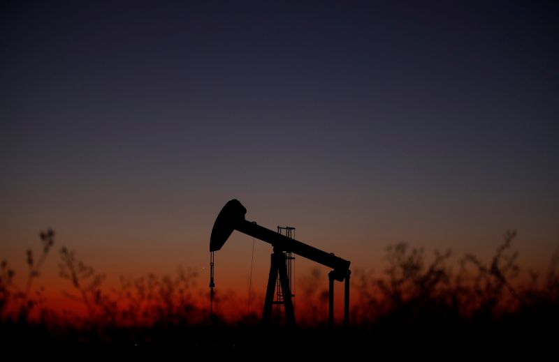 An oil pump is seen just after sunset outside Saint-Fiacre, near Paris, France September 17, 2019. REUTERS/Christian Hartmann