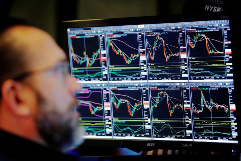 A trader works on the floor of the New York Stock Exchange shortly after the opening bell in New York City, U.S., November 21, 2019. REUTERS/Lucas Jackson