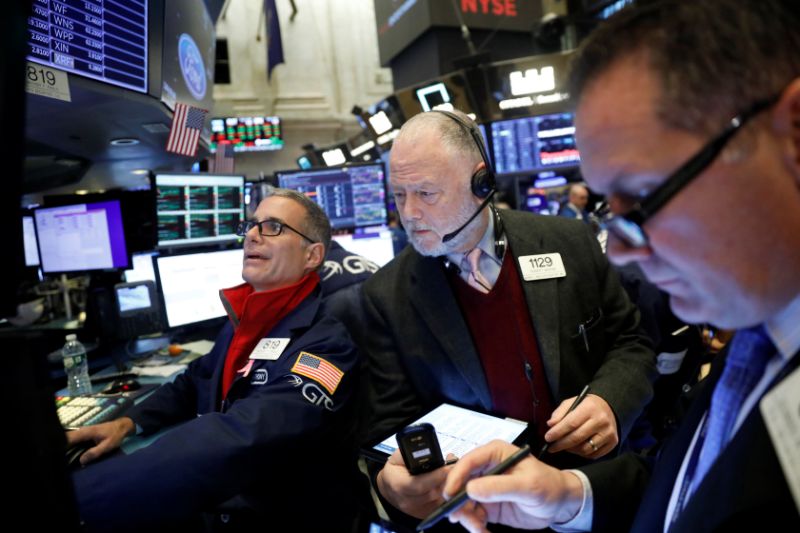 Traders work on the floor of the New York Stock Exchange shortly after the opening bell in New York City, U.S., November 21, 2019. REUTERS/Lucas Jackson