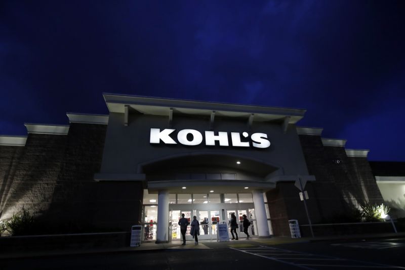 Customers walk outside of a Kohl's store in Colma, Calif., Friday, Nov. 29, 2019. Black Friday once again kicked off the start of the holiday shopping season. (AP Photo/Jeff Chiu)