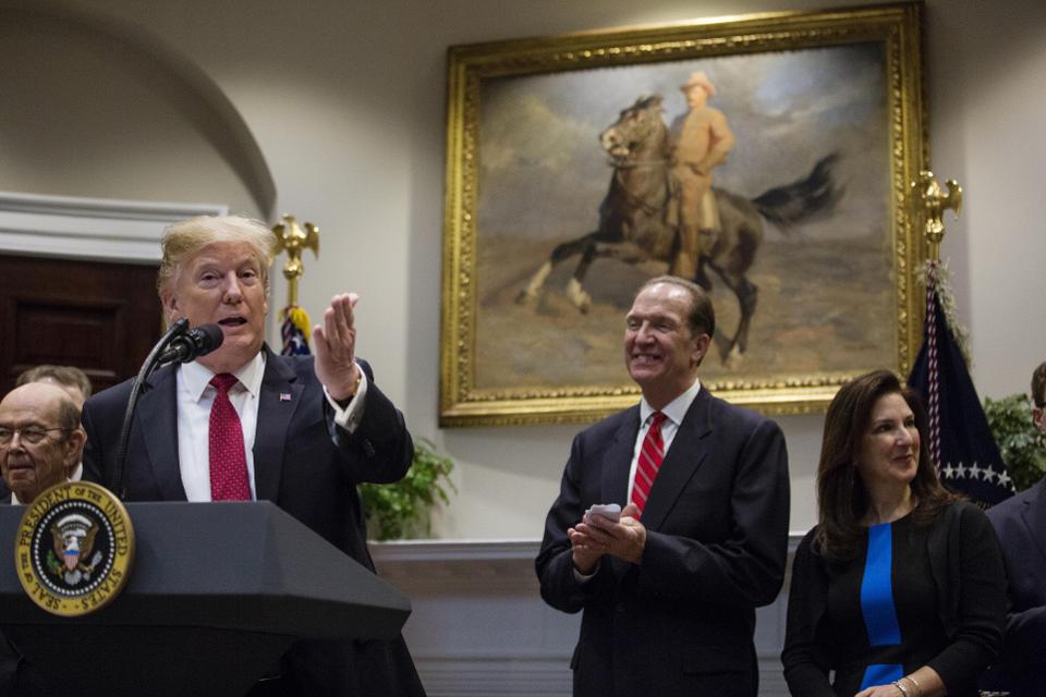 Donald Trump and David Malpass attend a press conference together.