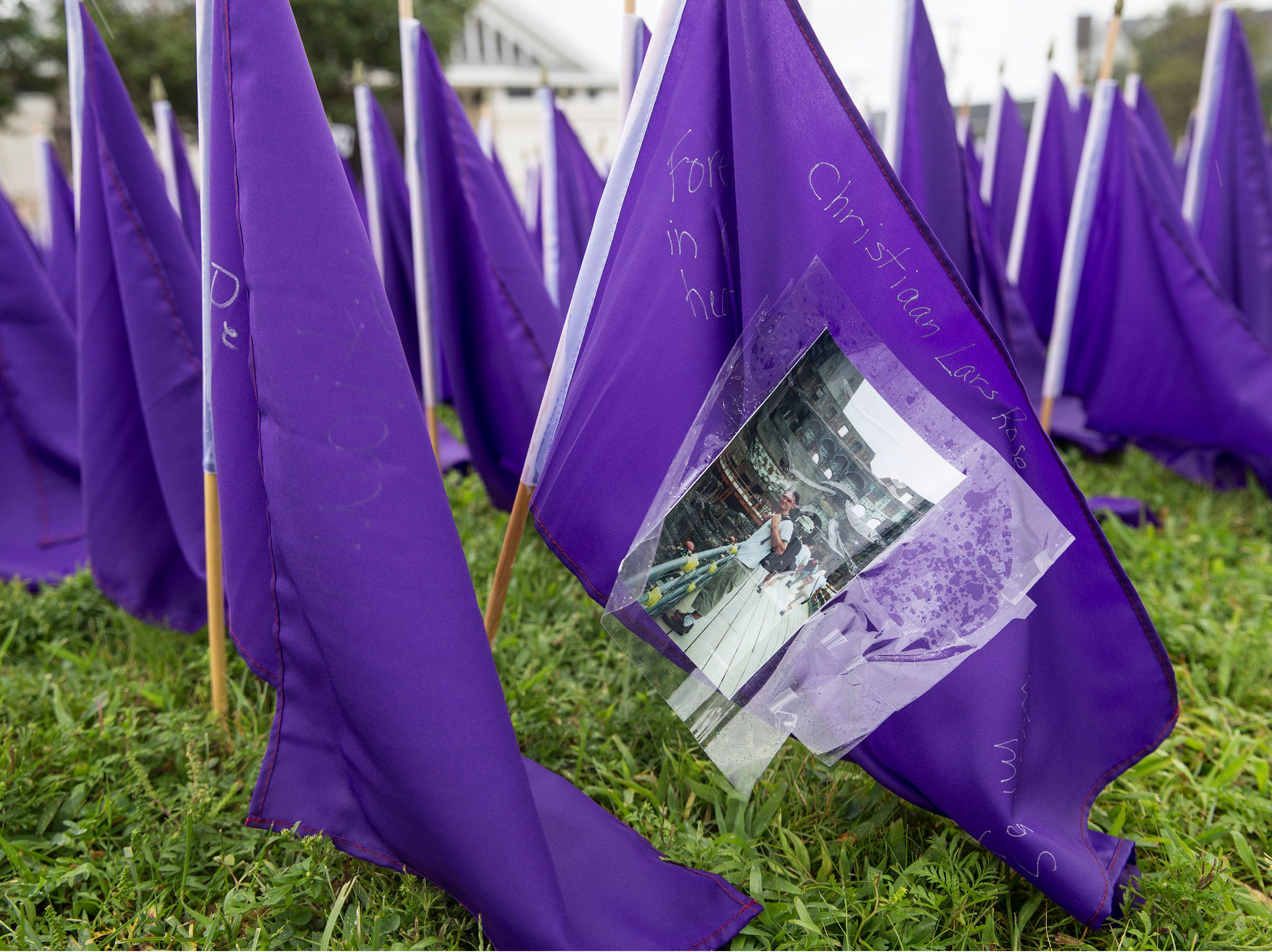 A sea of purple flags along the front lawn of Our Lady Star of the Sea represents the lives lost to opioid overdose in the state of New Jersey. Manasquan, NJ Friday, August 31, 2018